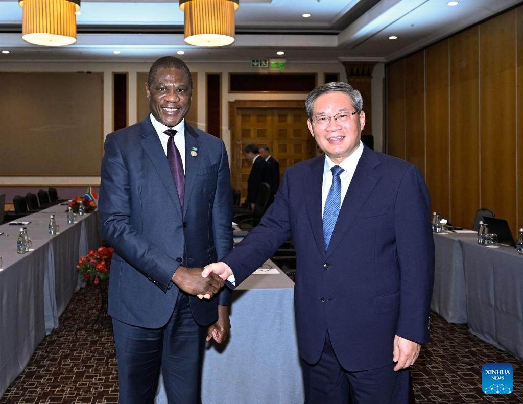 Chinese Premier Li Qiang meets with South African Deputy President Paul Mashatile in Johannesburg, South Africa, Nov. 23, 2025. (Xinhua/Shen Hong)