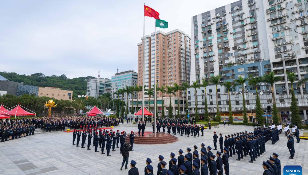 Macao SAR Marks 26th Anniversary of Return with Flag-Raising Ceremony and Reception