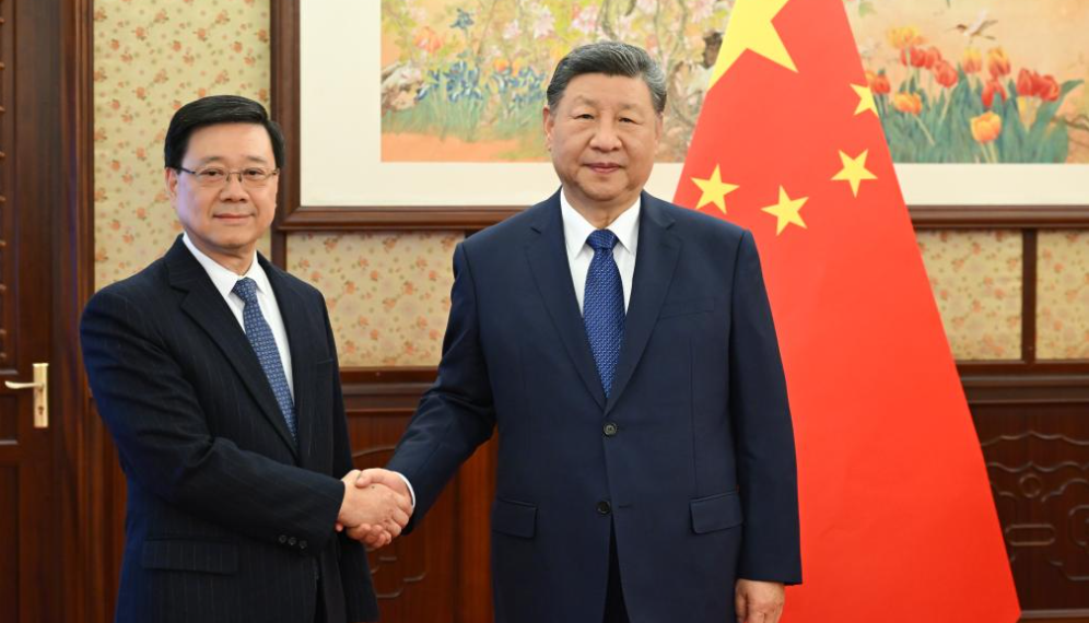 Xi hears report from HKSAR chief executive