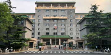 China says foreign investment decisions are made according to laws and regulations