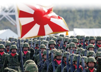 China urges Japan to break with militarism