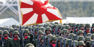 China urges Japan to break with militarism