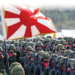 China urges Japan to break with militarism