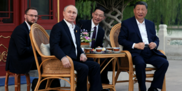 Xi holds talks with Putin in Beijing