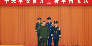 Xi presents orders to promote two military officers to rank of general